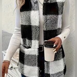 Black and white checkered fleece vest